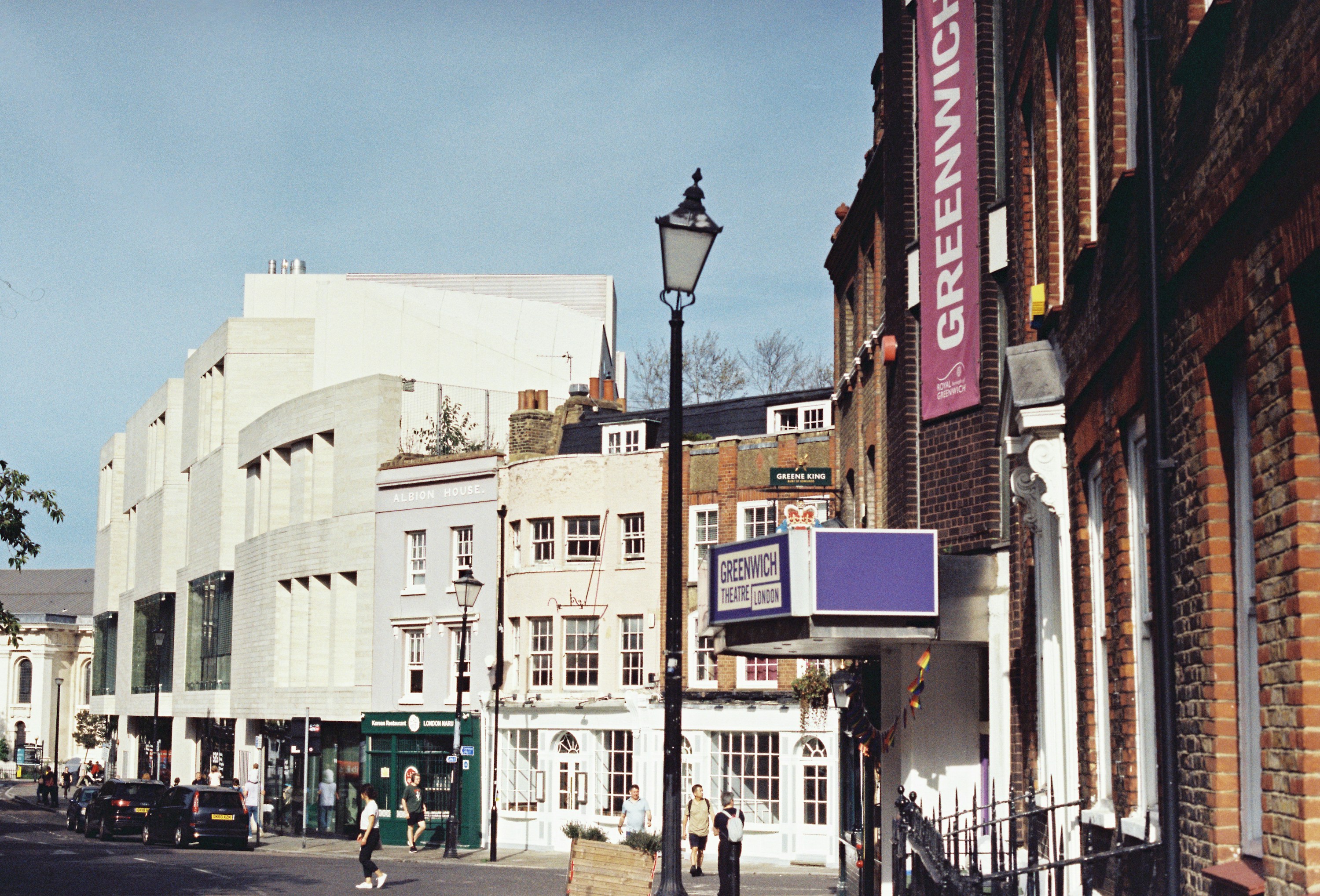 A street scene in Greenwich with pedestrians and neighbourhood activity.