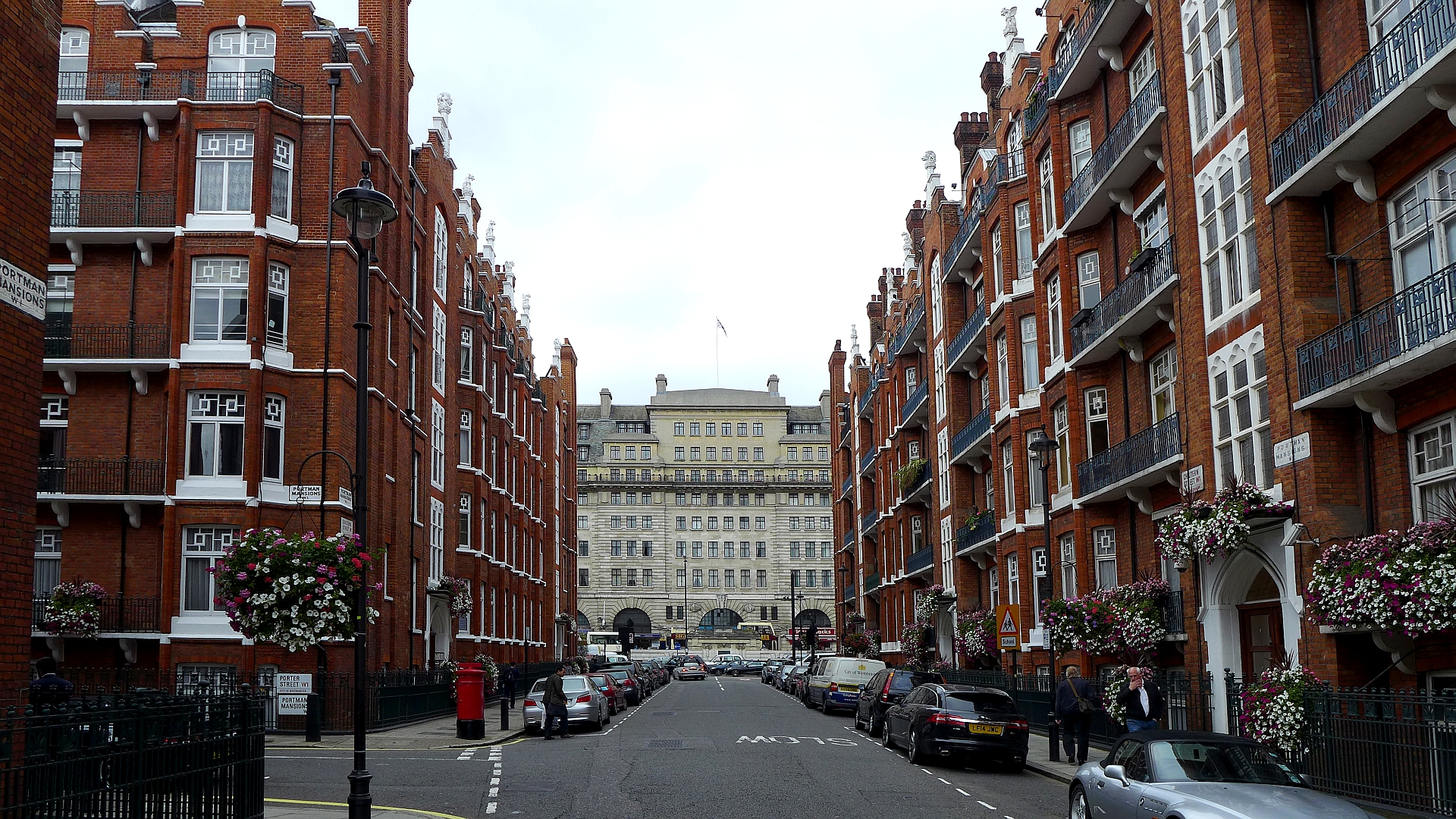 A broad view along Chiltern Street in Marylebone, lined with brick buildings and local businesses.