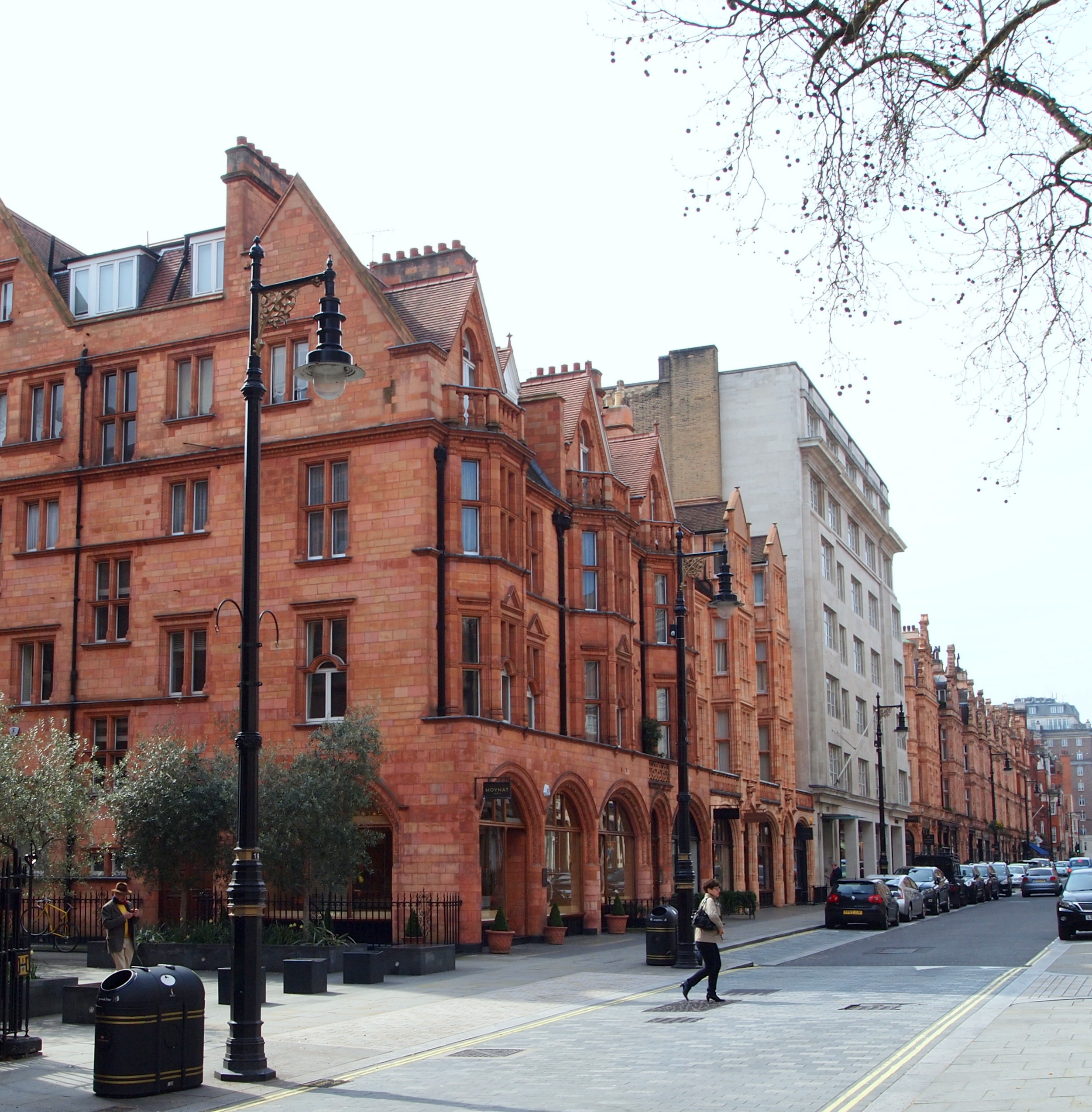 Elegant buildings and discreet shopfronts along Mount Street in Mayfair.